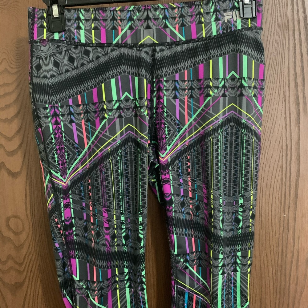 Two pairs of Fila Capri Running Pants